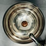 polished nickel hand basin and tap